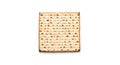 Single square matzah cracker with traditional perforation pattern, isolated on white background Royalty Free Stock Photo