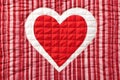 single stitched quilted heart on a cloth