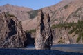 Single stone pillar in the riverbed. Royalty Free Stock Photo