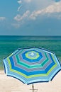 Single stripped, colorful beach umbrella