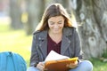 Single student girl studying reading notes