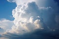 a single sunlit cloud among stormy clouds in the sky