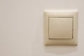 Single switch on a beige painted wall, copy space Royalty Free Stock Photo