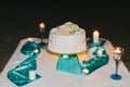 Single tier wedding cake decorated with roses