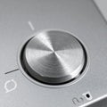 Brushed Metal Control Knob on a Modern Device Royalty Free Stock Photo