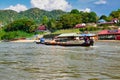 A single tourist in a river tour boat at Taman Negara in Malaysia