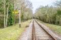 Single Track Railway Line with Yellow Signal Royalty Free Stock Photo