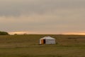 Single Traditional Nomadic House on Grassland Horizon at Sunset Royalty Free Stock Photo