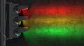 Single traffic light close-up in side view at night. The traffic light casts light on a black wall. Creative conceptual Royalty Free Stock Photo