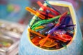 Single-use plastic spoons for takeaway food. Stack of colorful dessert spoons. Plastic waste of disposable cutlery Royalty Free Stock Photo