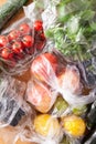 Single use plastic waste issue. fruits and vegetables in plastic bags Royalty Free Stock Photo