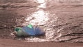 Plastic waste - medical mask, plastic bottle and bags by ocean. World ocean pollution. environmental issues. banner