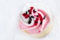 Single Valentines Day Cupcake on White Lace Royalty Free Stock Photo