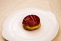 Single vanilla raspberry jelly-filled donut