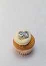 Single vanilla sponge cup cake with silver glitter number 30 on