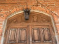 Single vintage lantern hanging over the door Royalty Free Stock Photo