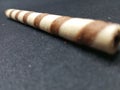 Single Wafer Stick on Dark Background, Royalty Free Stock Photo
