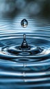 Single Water Drop Submerged in Clear Water, Ripples and Reflections Visible