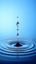 Single Water Droplet Creating Concentric Ripples In Tranquil Blue Liquid, Minimalist Composition. Royalty Free Stock Photo
