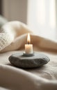 Single White Candle on Gray Stone Royalty Free Stock Photo