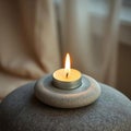 Single White Candle on Gray Stone Royalty Free Stock Photo