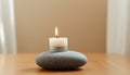Single White Candle on Gray Stone Royalty Free Stock Photo