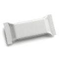 A single white chocolate bar wrapped in a crinkled foil wrapper on a white background Royalty Free Stock Photo