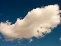 A single white Cloud in bright blue Sky Royalty Free Stock Photo