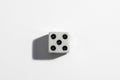 Single white dice with a five on a white background. Win or lose. Catch your luck. Gambling equipment Royalty Free Stock Photo