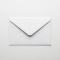 Single white envelope on plain background Royalty Free Stock Photo
