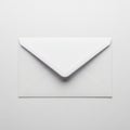 Single white envelope on plain background Royalty Free Stock Photo