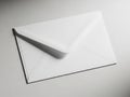 Single white envelope on surface Royalty Free Stock Photo