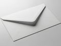 Single white envelope on surface Royalty Free Stock Photo