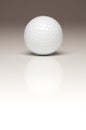 Single White Golf Ball on Gradated Backgroun