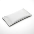 A single white packet sealed with a perforated edge on a plain background Royalty Free Stock Photo