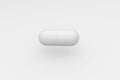 Single white pill on white background. Antibiotic in the capsule. 3d rendering Royalty Free Stock Photo