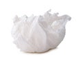 Single white screwed or crumpled tissue paper or napkin in strange shape after use in toilet or restroom isolated on white