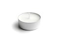 A single white tea light candle with a wick on a white background {Ai generated Royalty Free Stock Photo