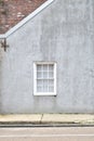 Single white window on gray stucco background Royalty Free Stock Photo