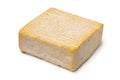 Single whole French Le Carre du Pere Antoine cheese close up on white background