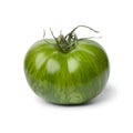 Single whole fresh green zebra tomato close up on white background Royalty Free Stock Photo