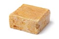 Single whole piece of Limburger or Herve cheese on white background