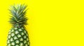 Single whole pineapple on yellow background Royalty Free Stock Photo