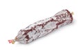 Single whole Rosette de Lyon, a French pork saucisson on white background