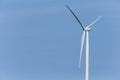 Single wind turbine against blue sky Royalty Free Stock Photo