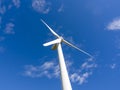 Single wind turbine in blue sky Royalty Free Stock Photo