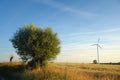 Single wind turbine, rural landscape. Royalty Free Stock Photo