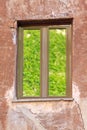 Single window closeup in a cracked wall Royalty Free Stock Photo