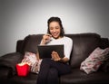 Single woman is having fun with streaming videos on the digital Royalty Free Stock Photo