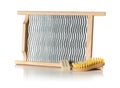 Single wood and metal washboard or wash board with brush and piece of washing soap side view Royalty Free Stock Photo